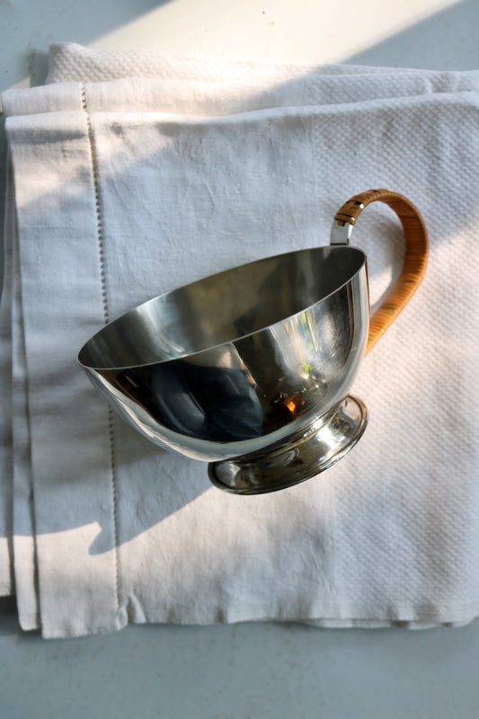 vintage Danish Lundstofte stainless steel sauce dish with rattan handle