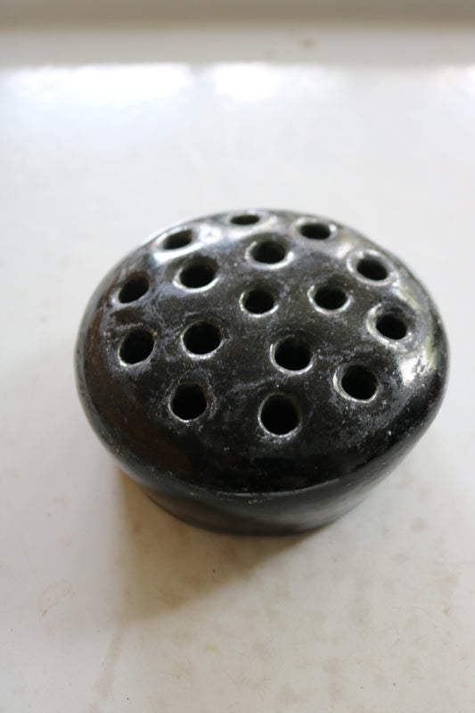 vintage black glazed ceramic flower frog