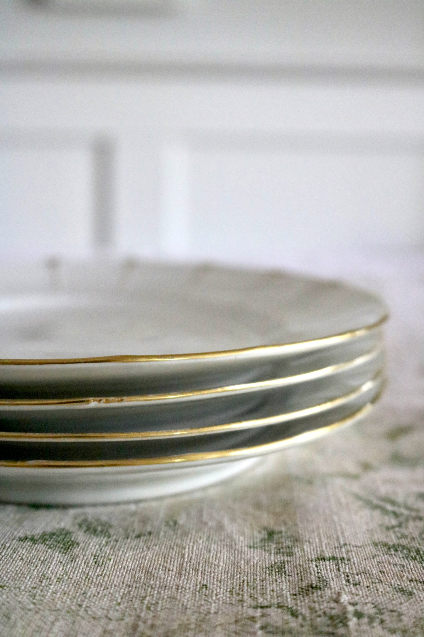 antique white and gold porcelain plates, set of 4