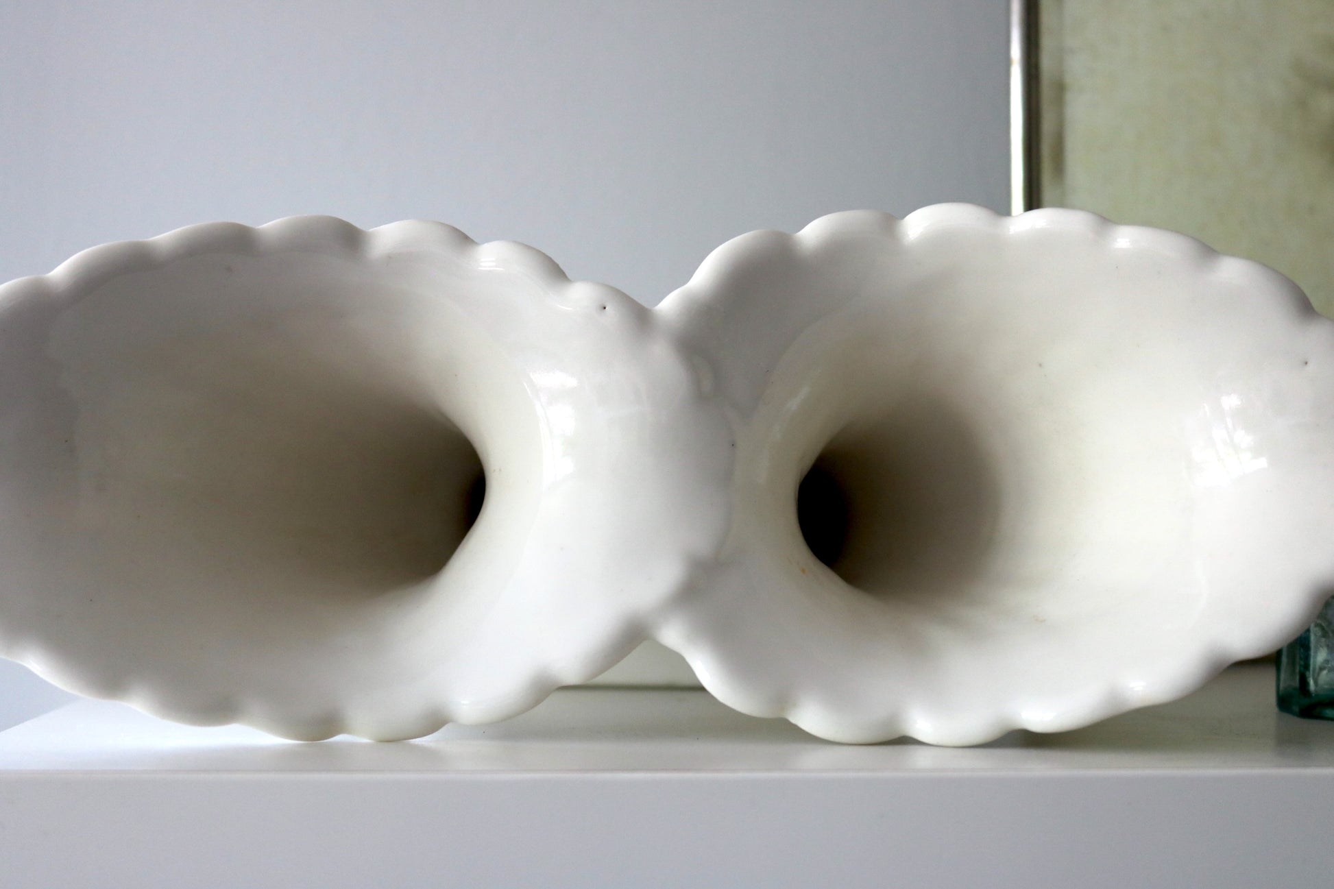 top view of a vintage white vase with double vases in an art nouveau style