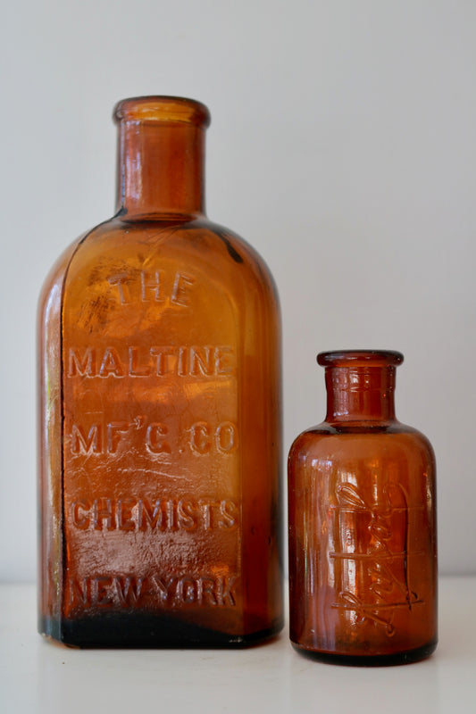 antique amber glass apothecary bottles - set of 2