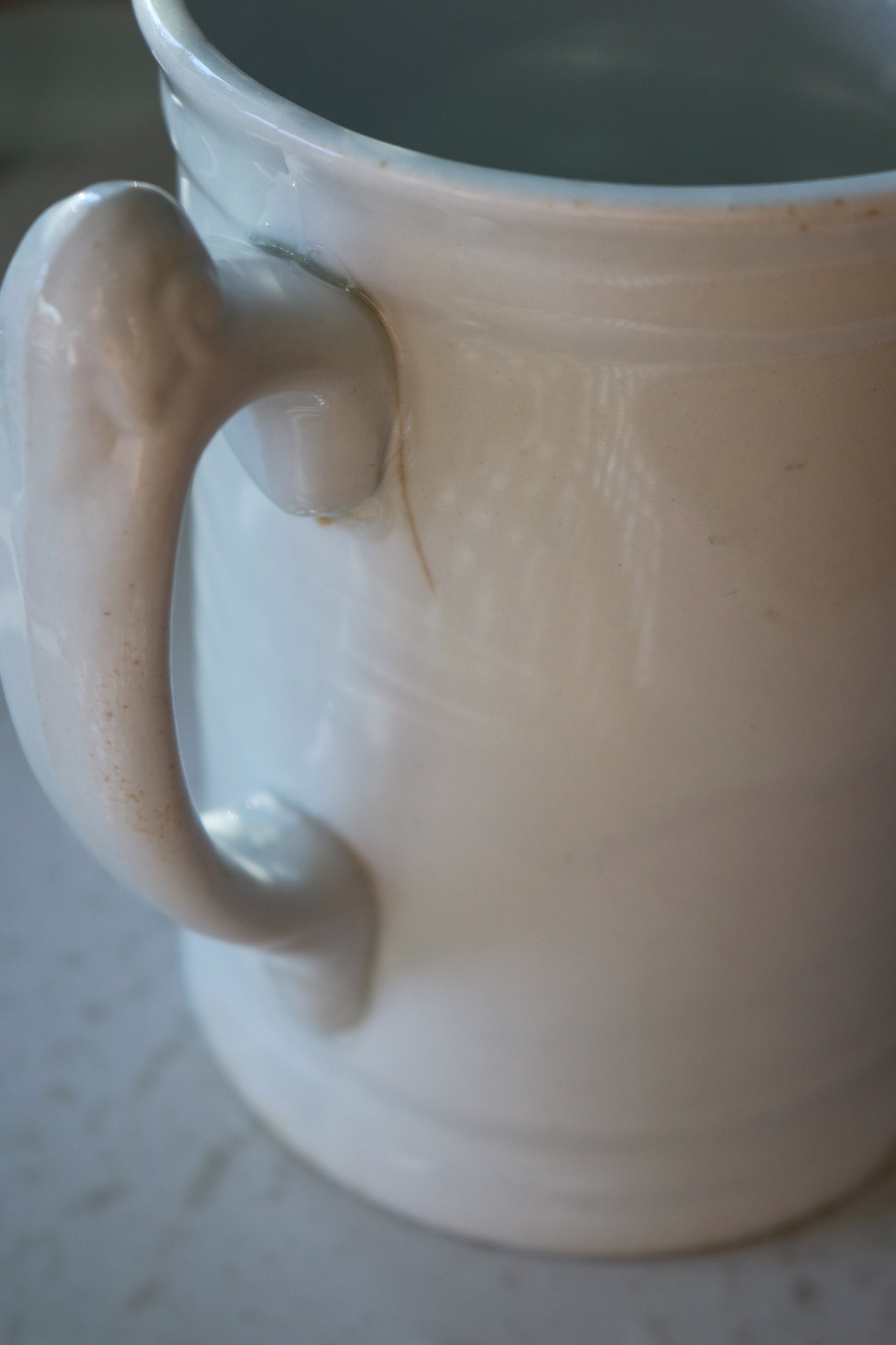 flaw of antique English white ironstone pitcher, Alfred Meakin