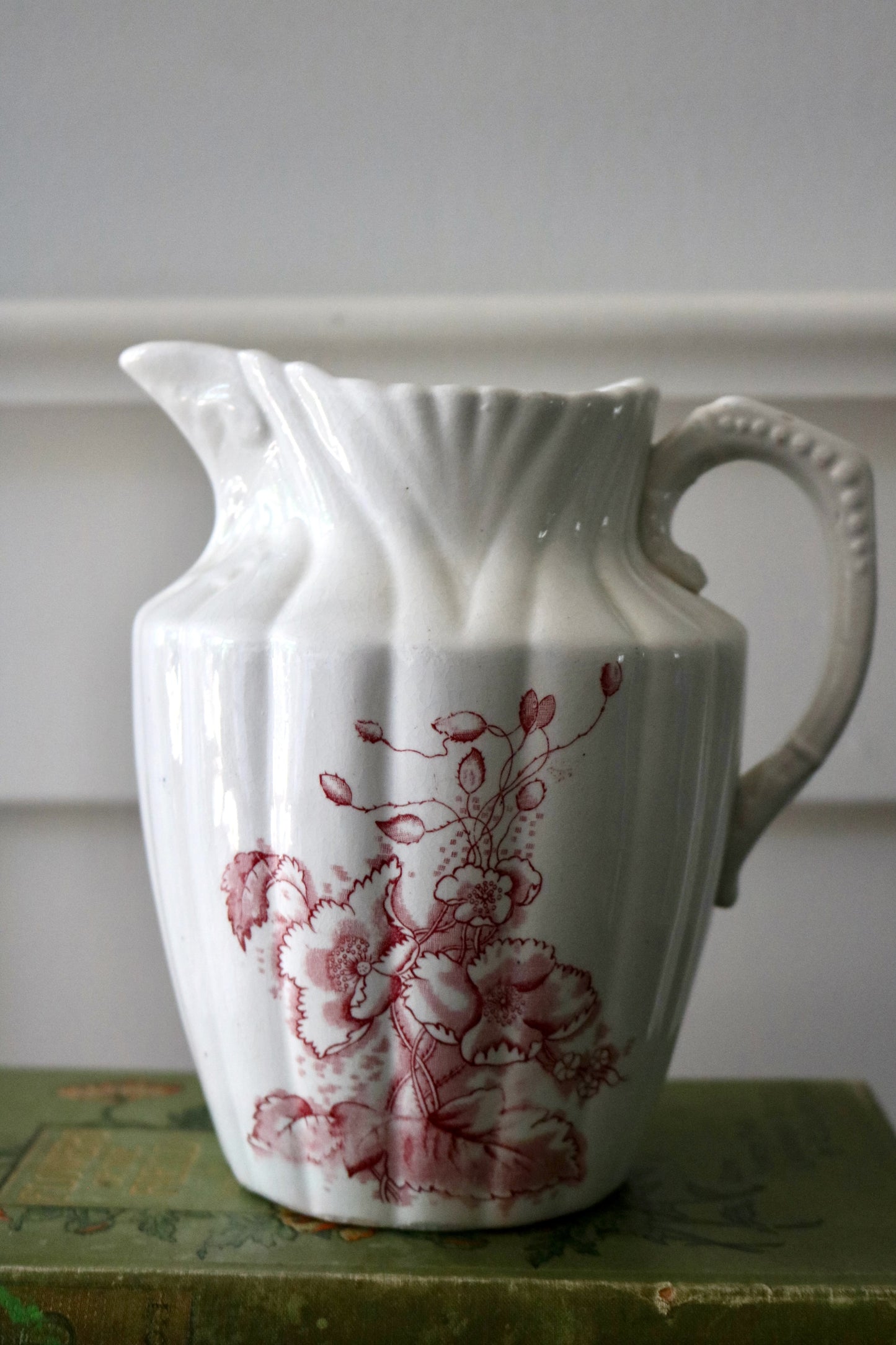 Antique cranberry transferware on white ironstone pitcher