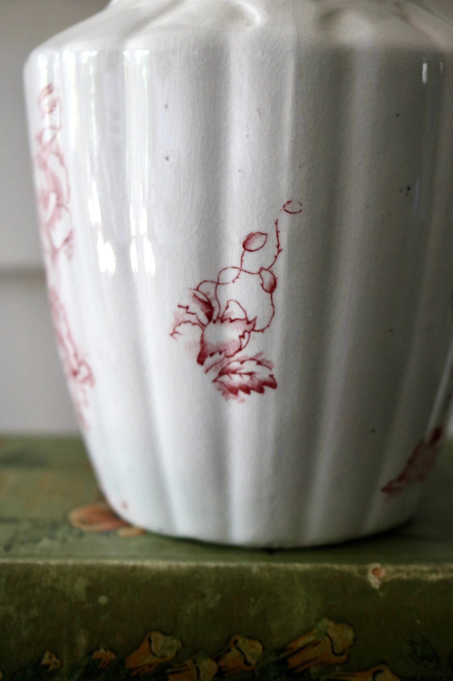 Antique cranberry transferware on white ironstone pitcher