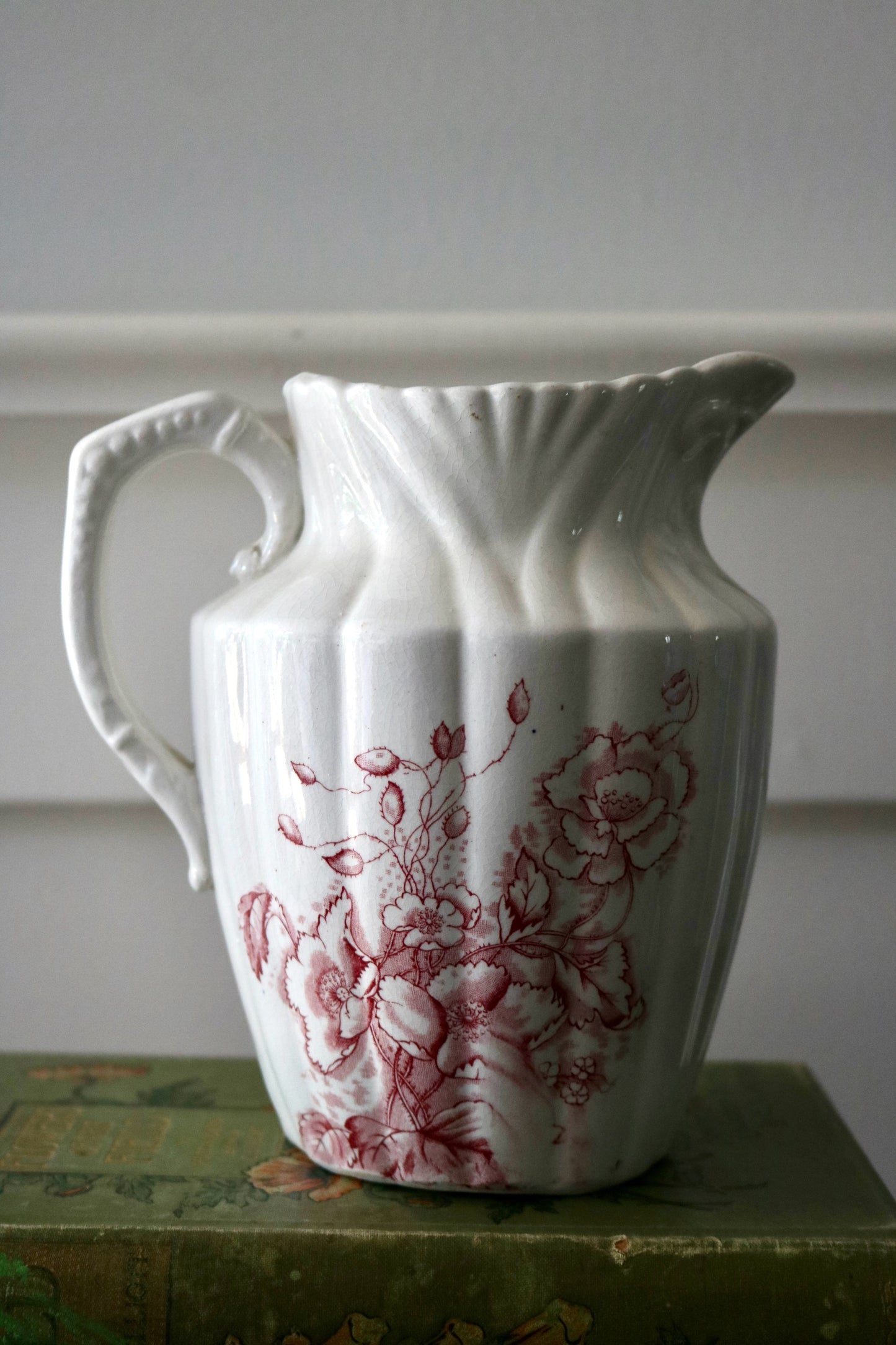 Antique cranberry transferware on white ironstone pitcher