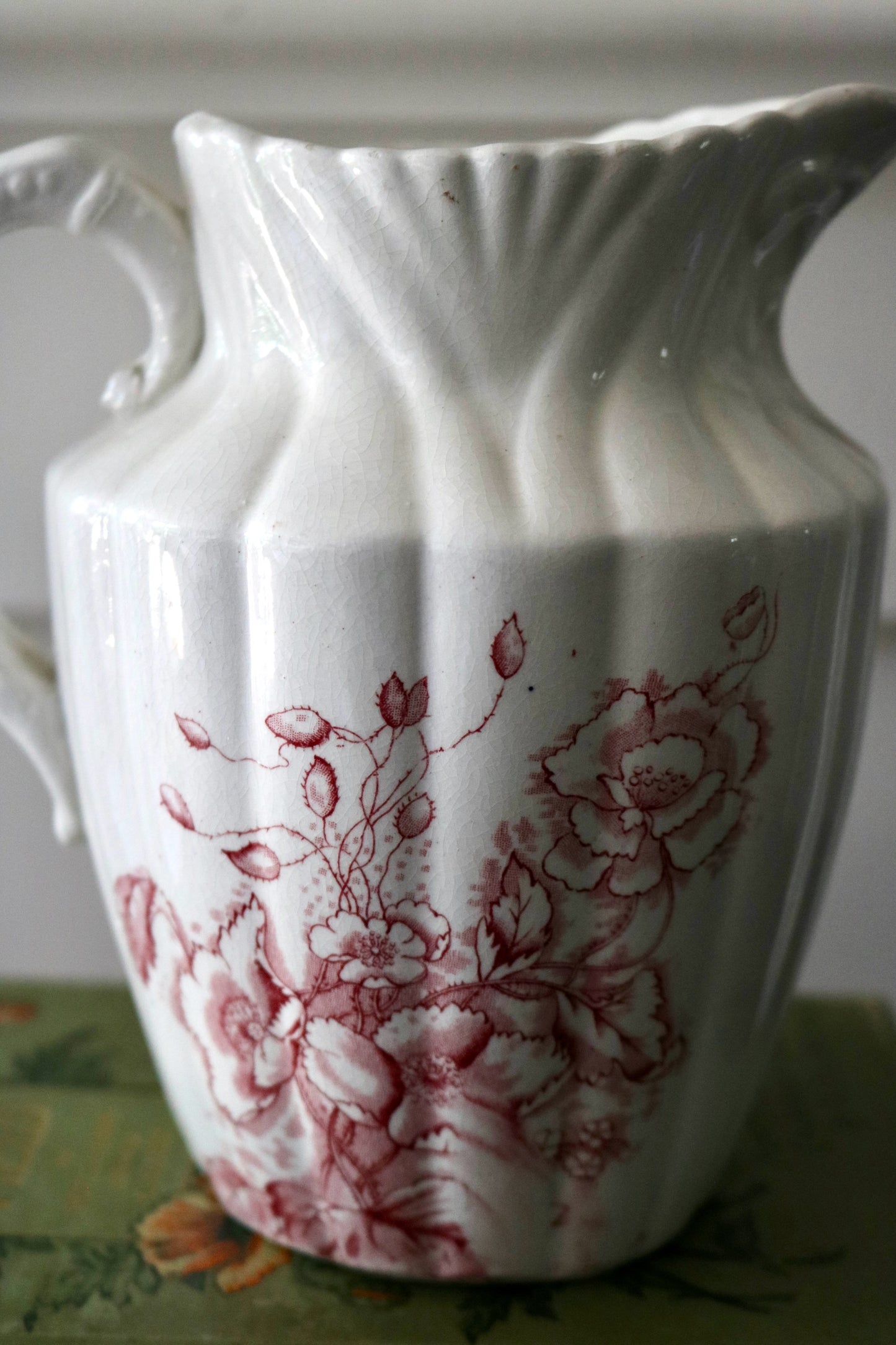 Antique cranberry transferware on white ironstone pitcher