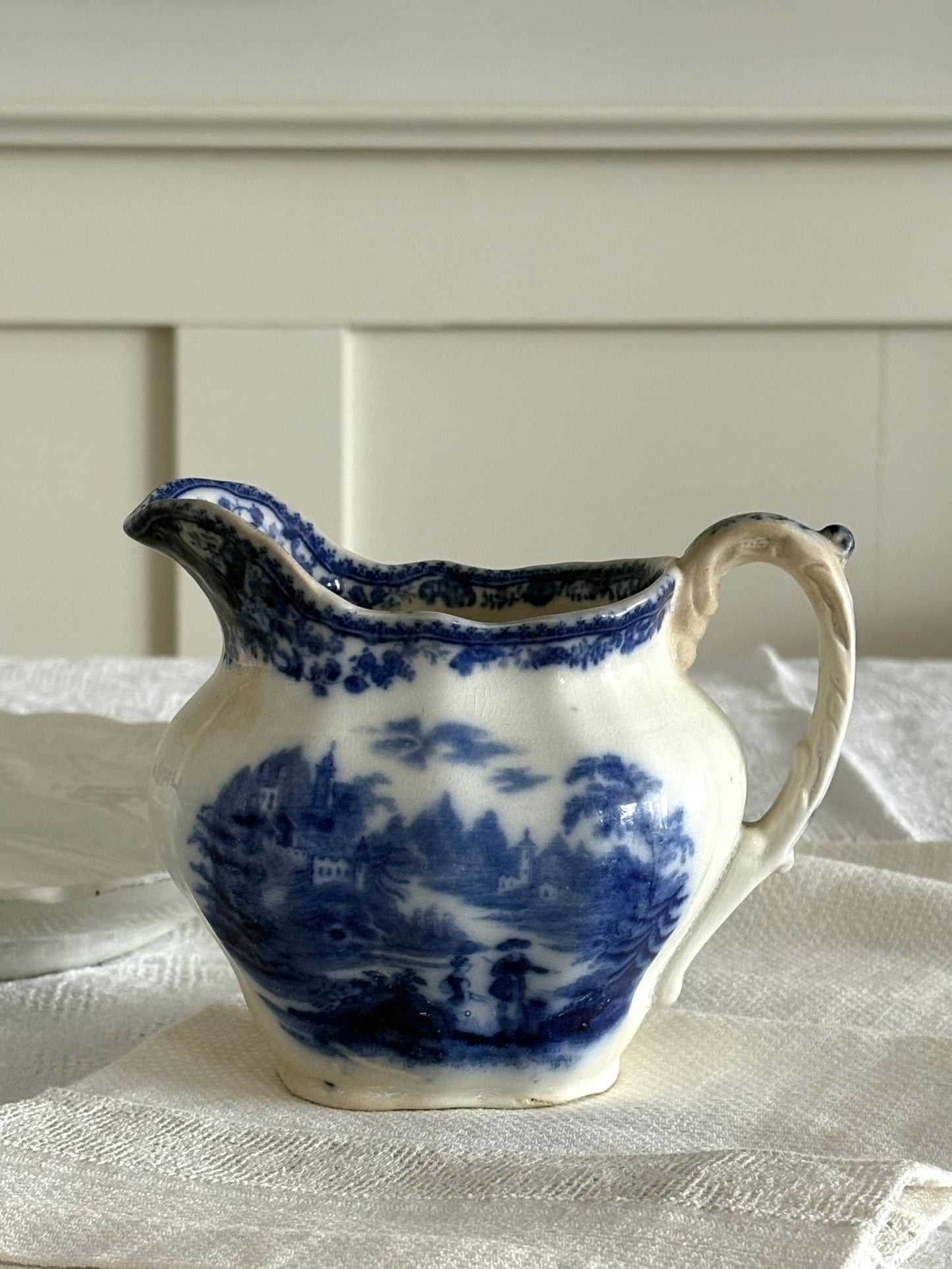 antique late 19th Century Flow Blue transferware pitcher "Non Pareil" pattern