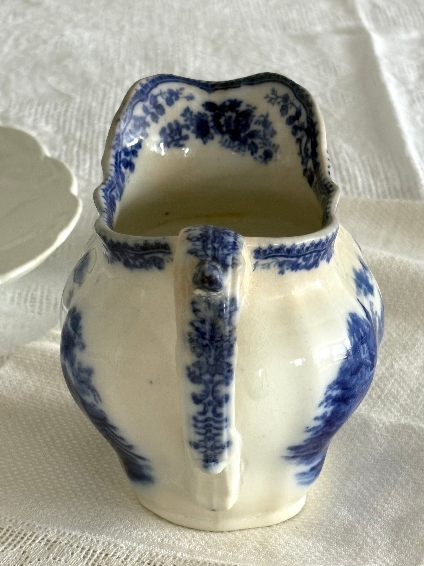 antique late 19th Century Flow Blue transferware pitcher "Non Pareil" pattern