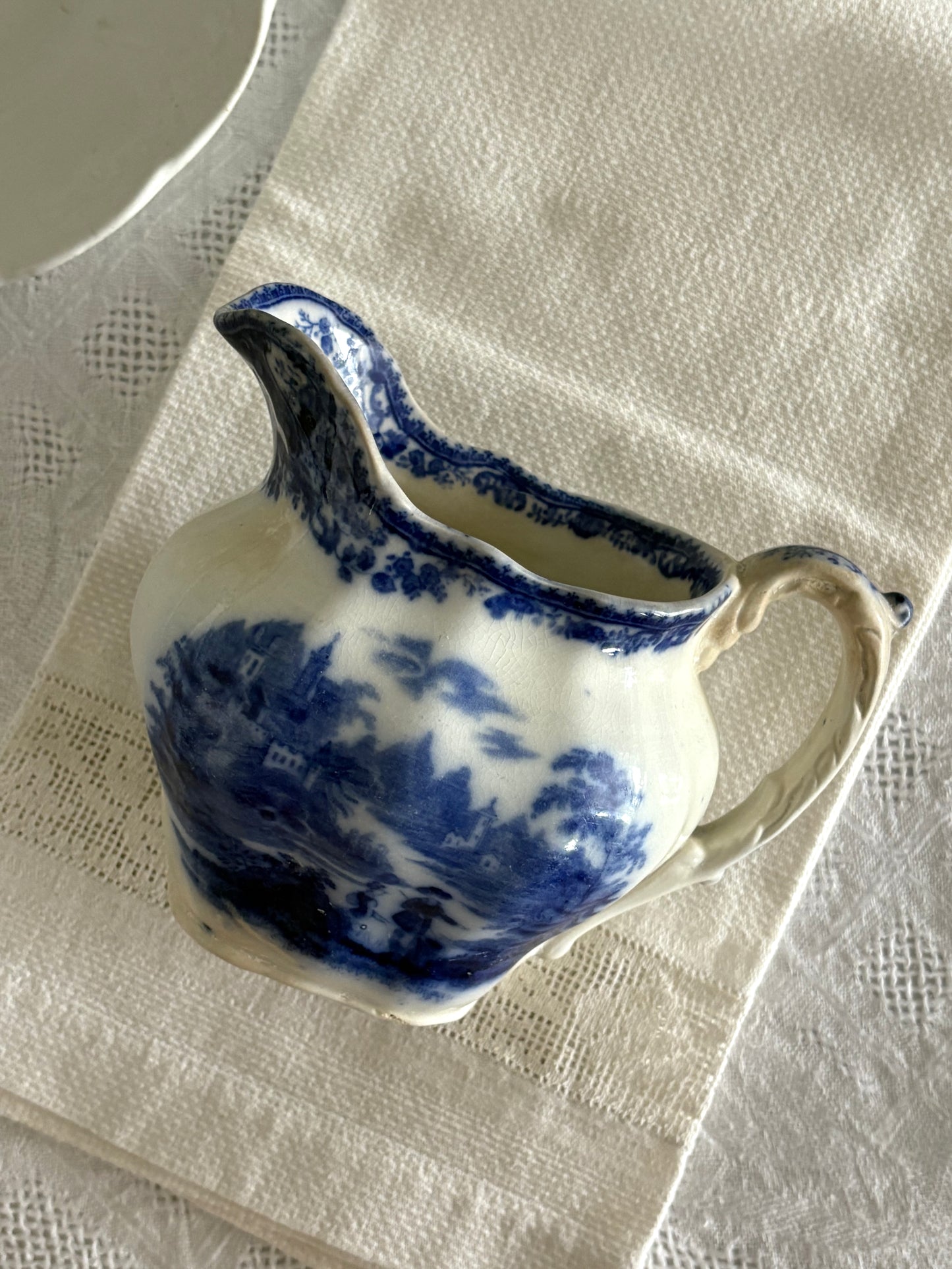 antique late 19th Century Flow Blue transferware pitcher "Non Pareil" pattern