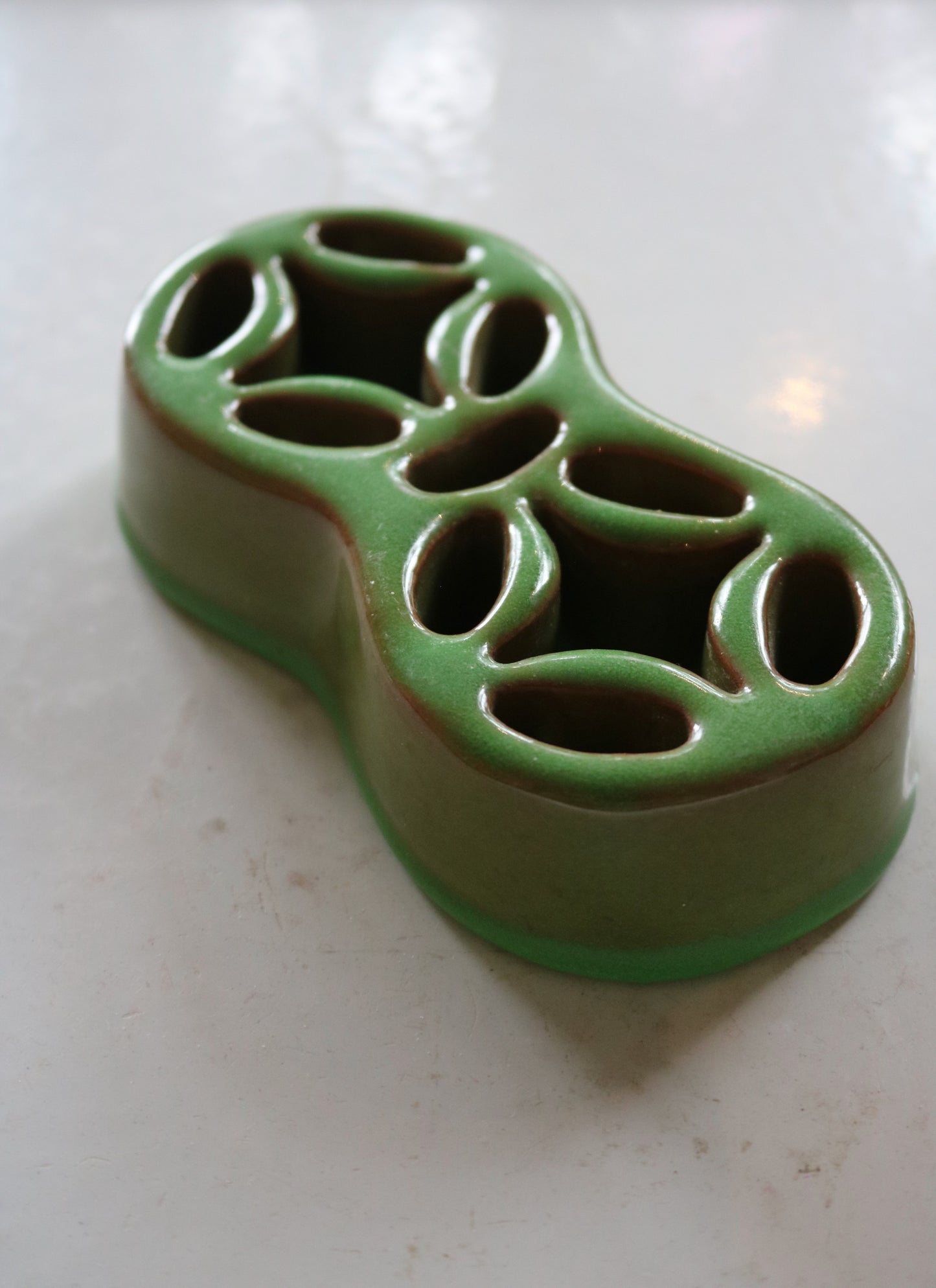 green ceramic flower frog