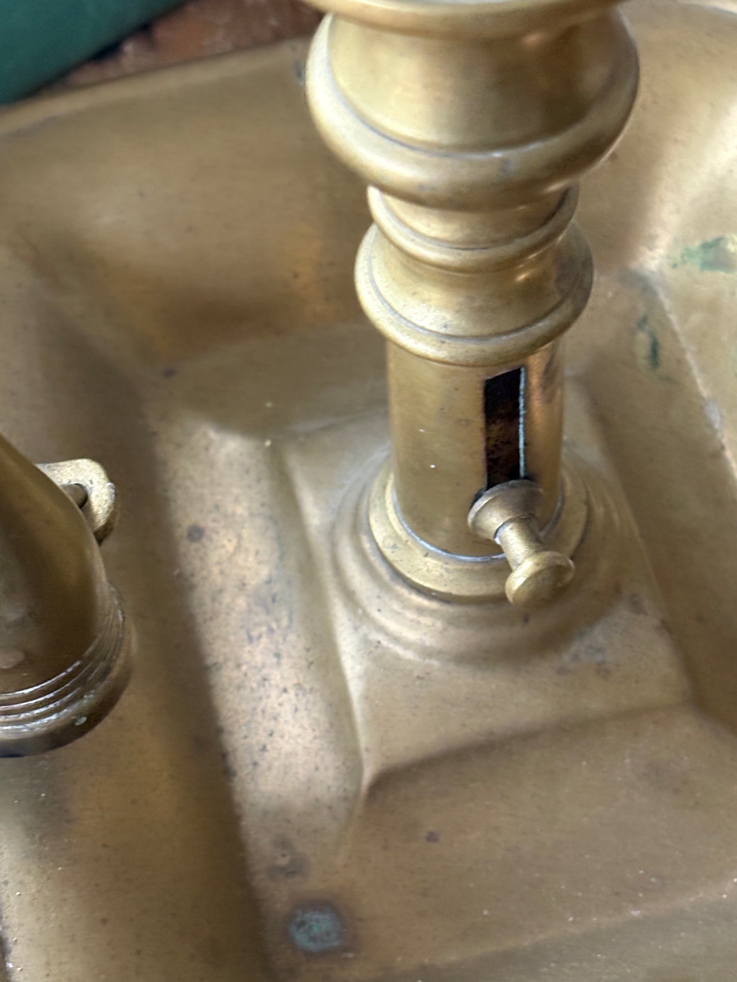 antique brass chamberstick-style candleholder with douter