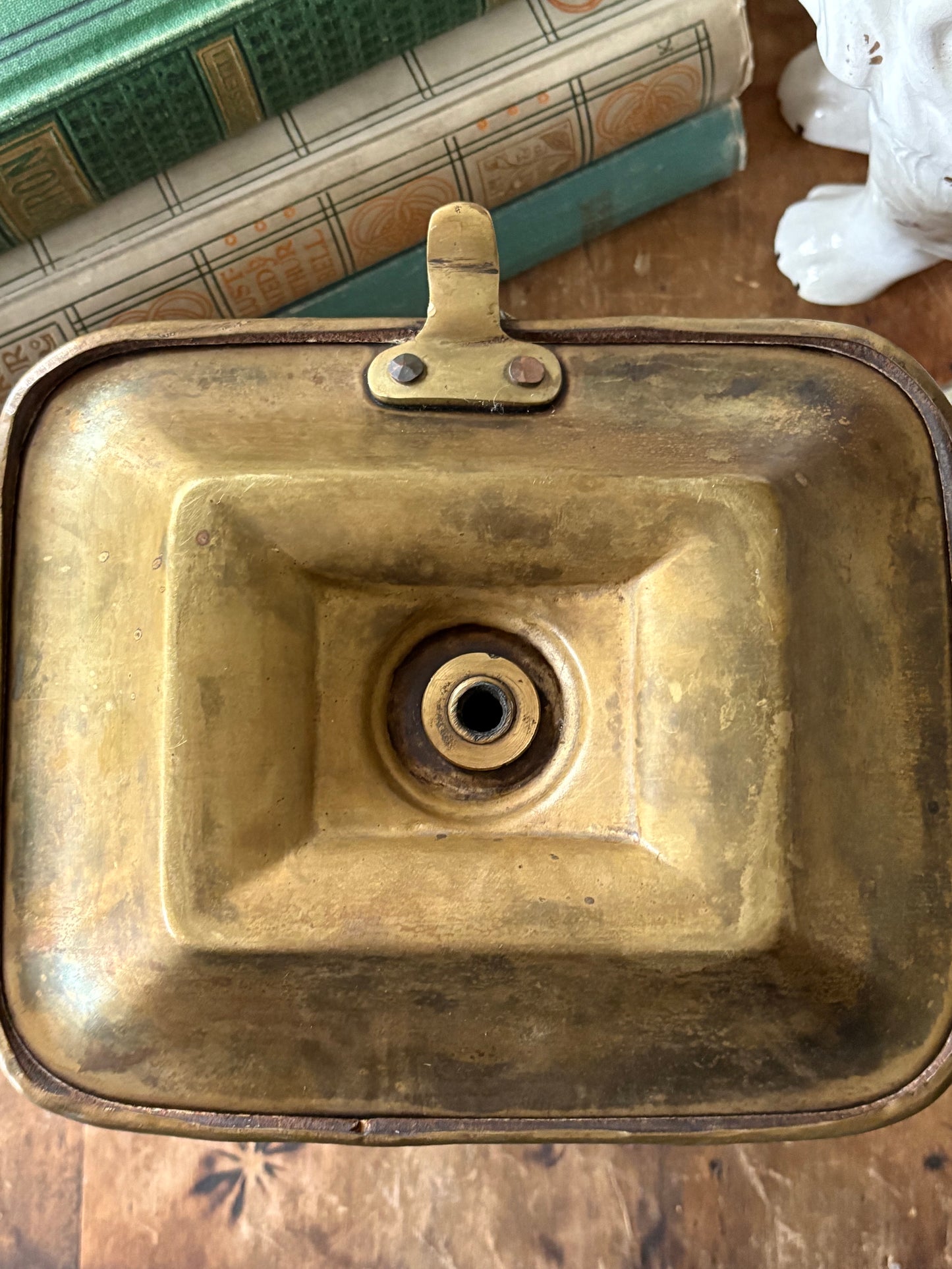 antique brass chamberstick-style candleholder with douter