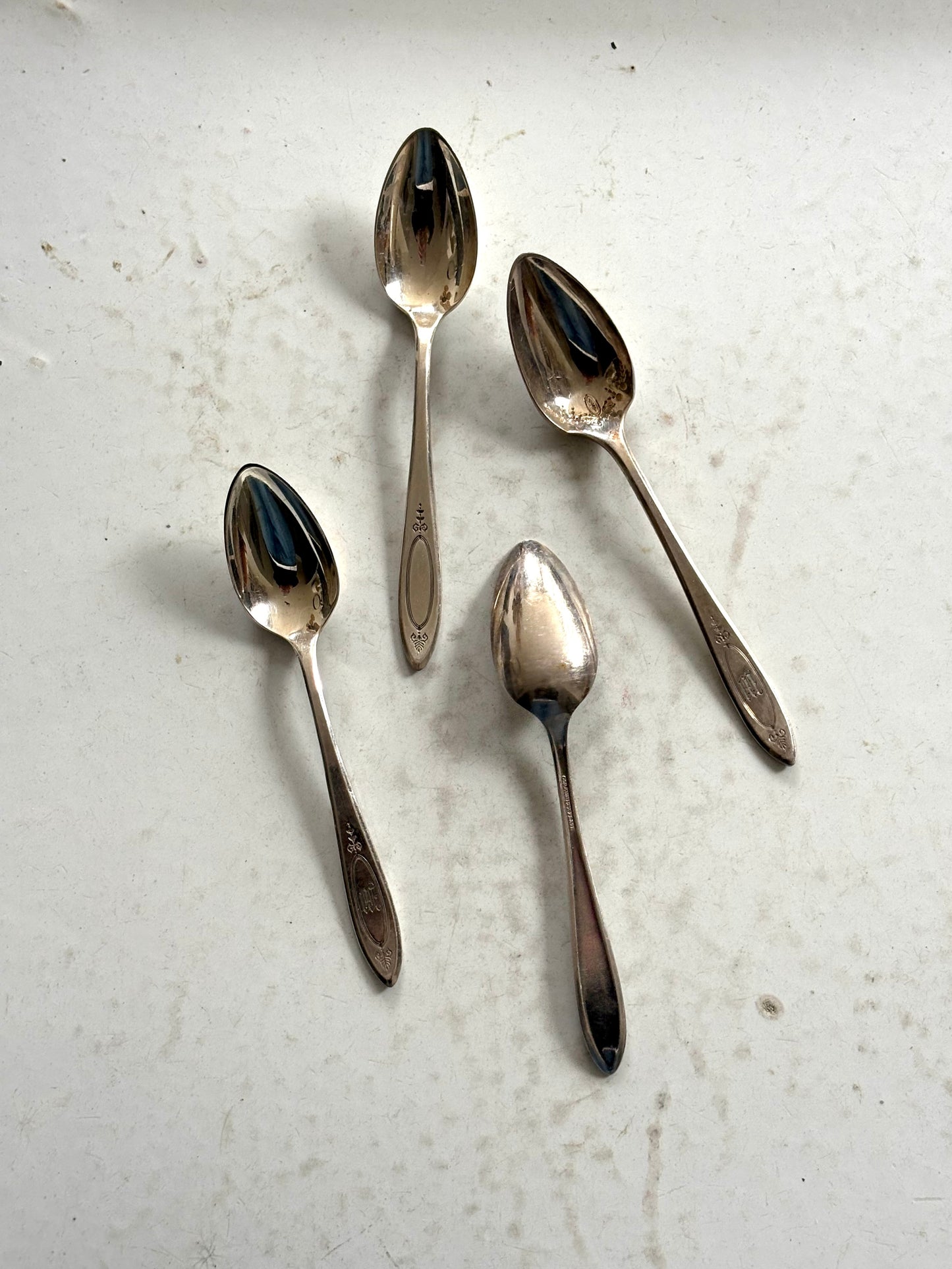 Silver-plate demitasse spoons, set of 4.