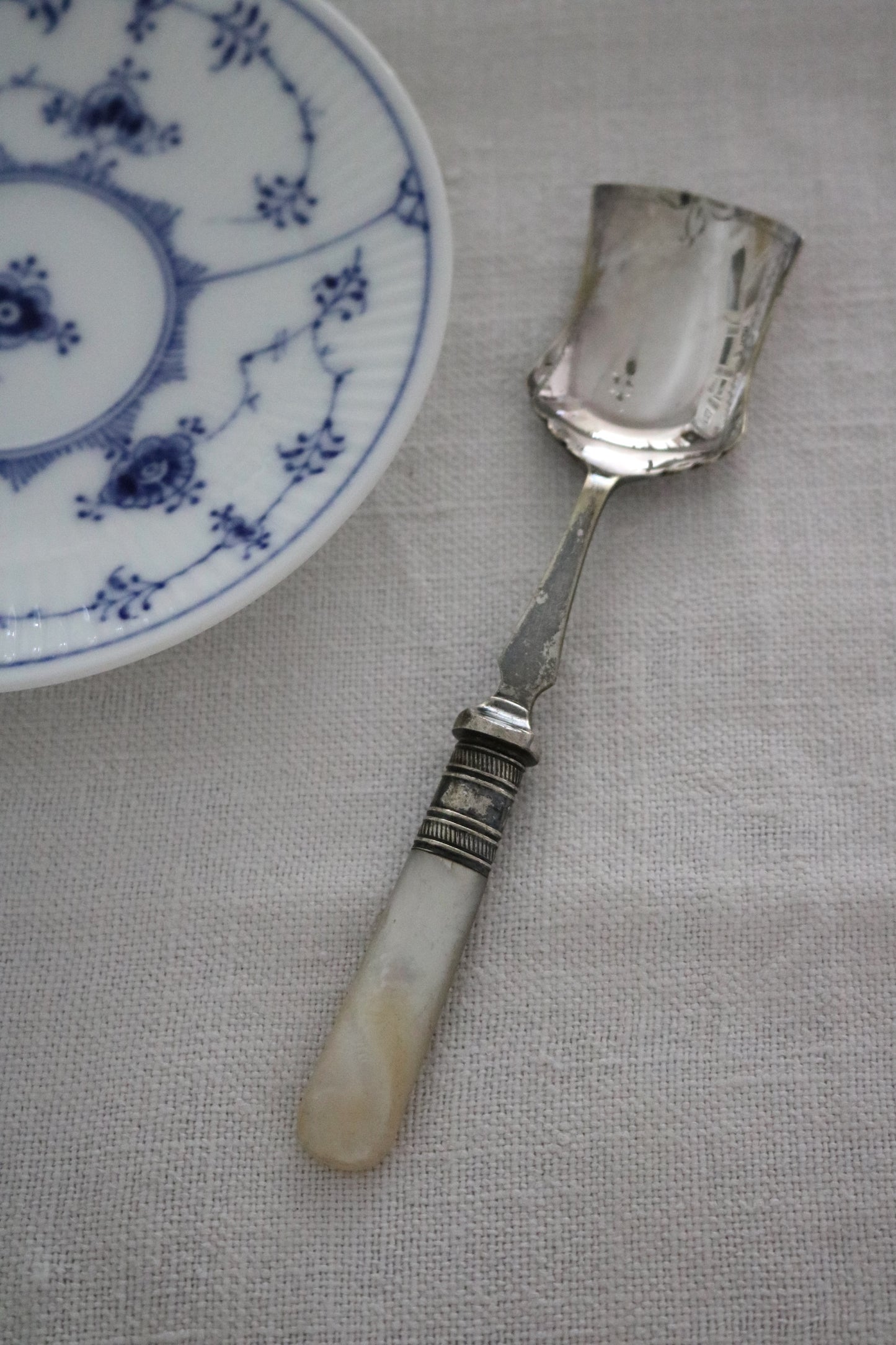 antique silver plate sugar spoon with mother of pearl handle