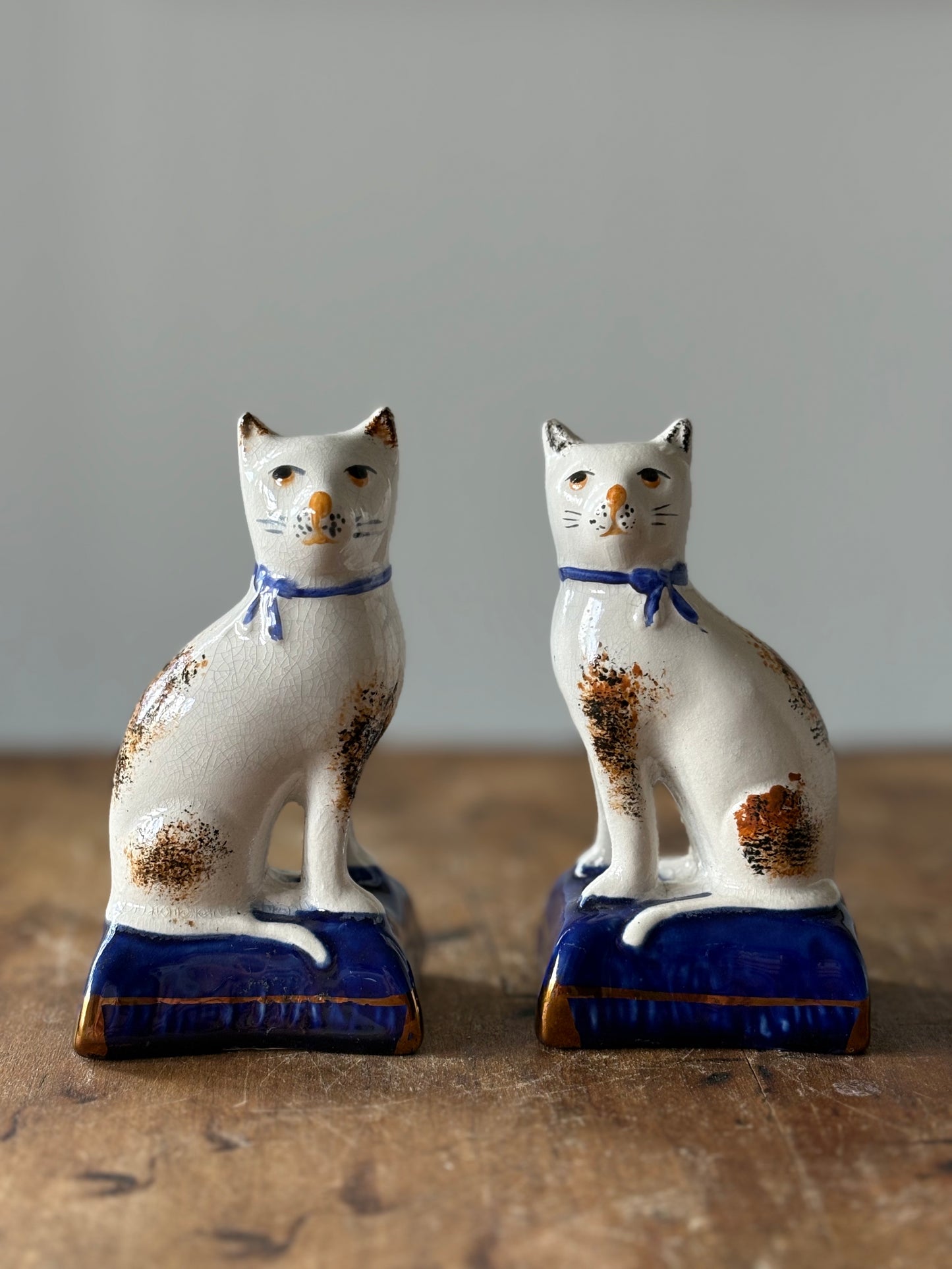vintage Staffordshire mantel cats - set of 2