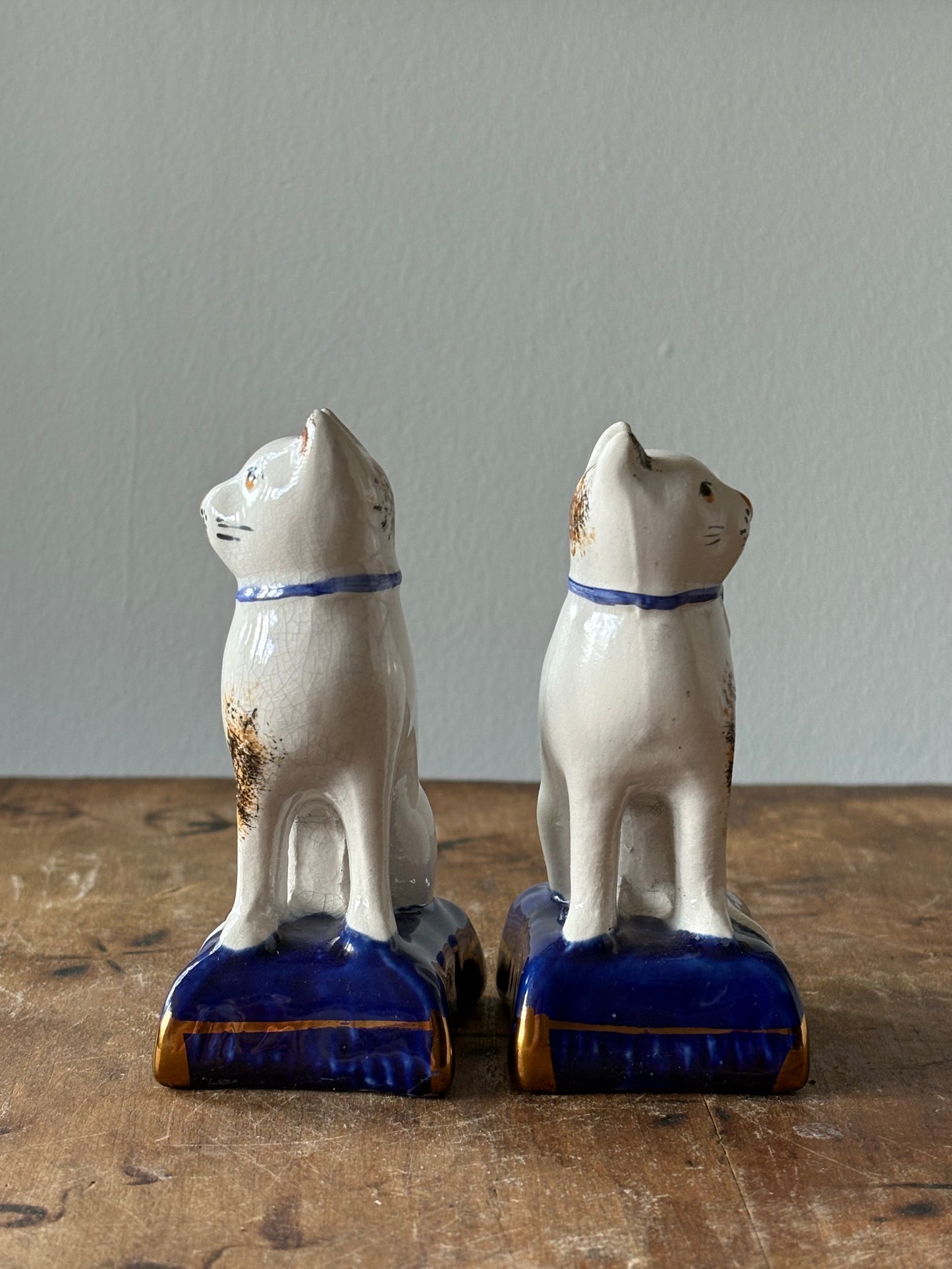 vintage Staffordshire mantel cats - set of 2