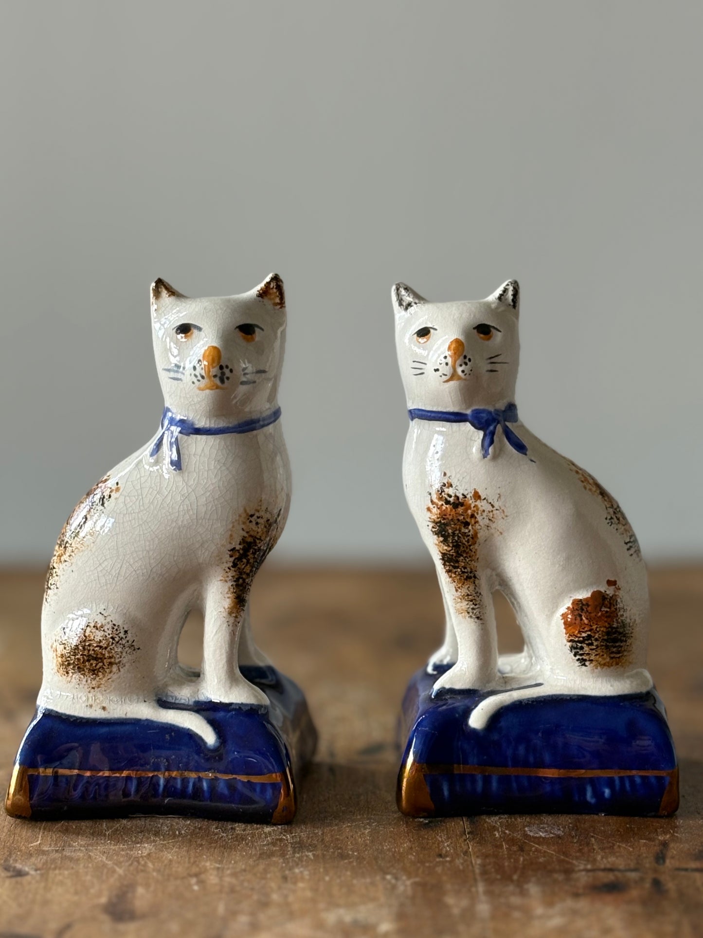 vintage Staffordshire mantel cats - set of 2