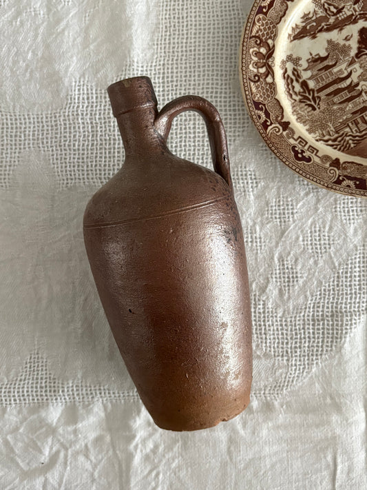 antique brown earthenware jug