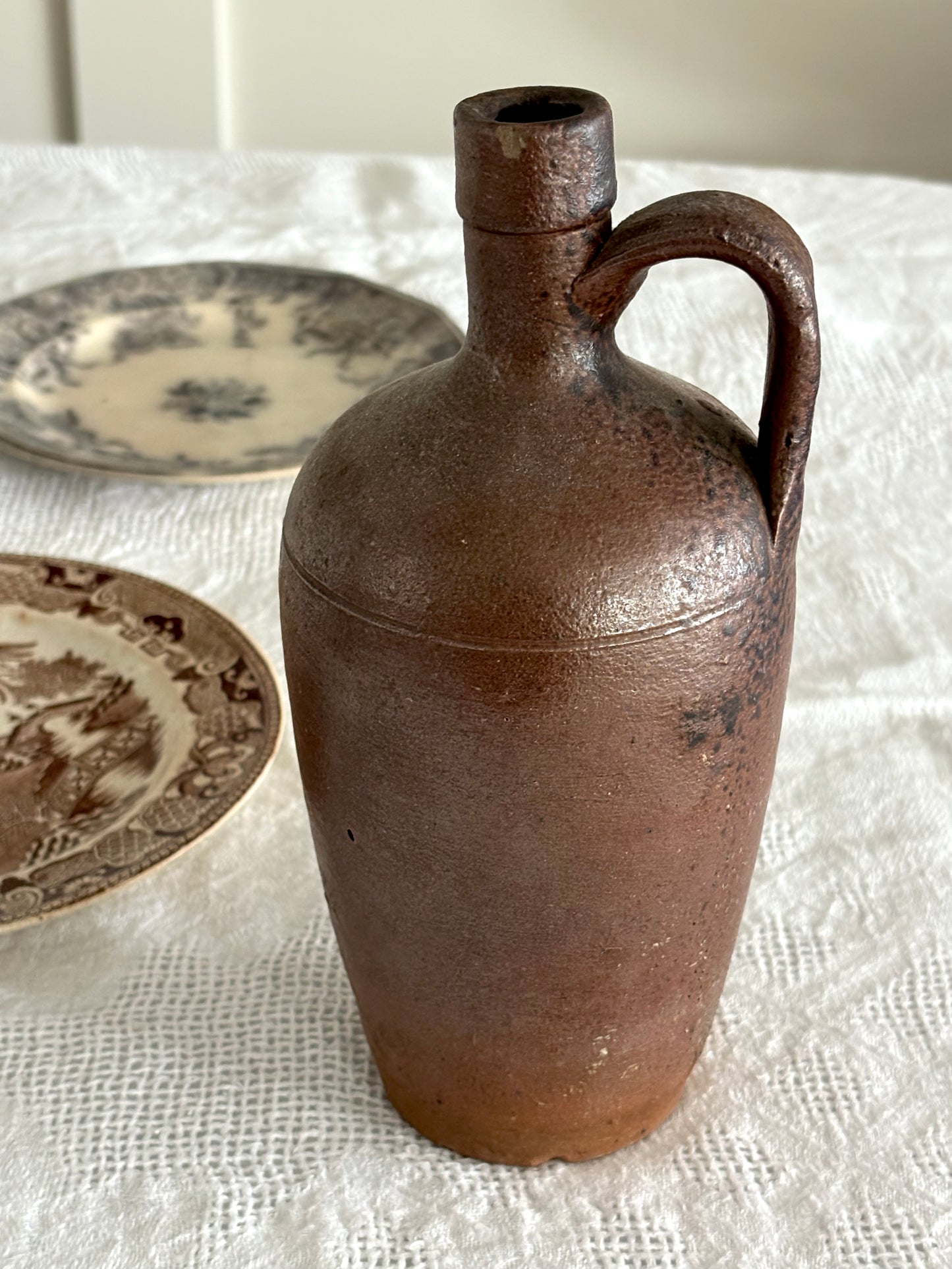 antique brown earthenware jug