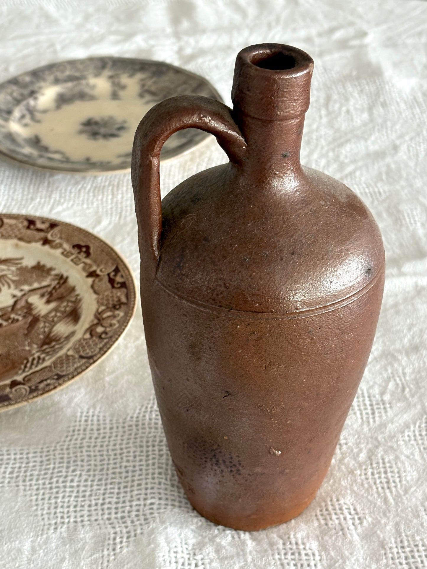 antique brown earthenware jug