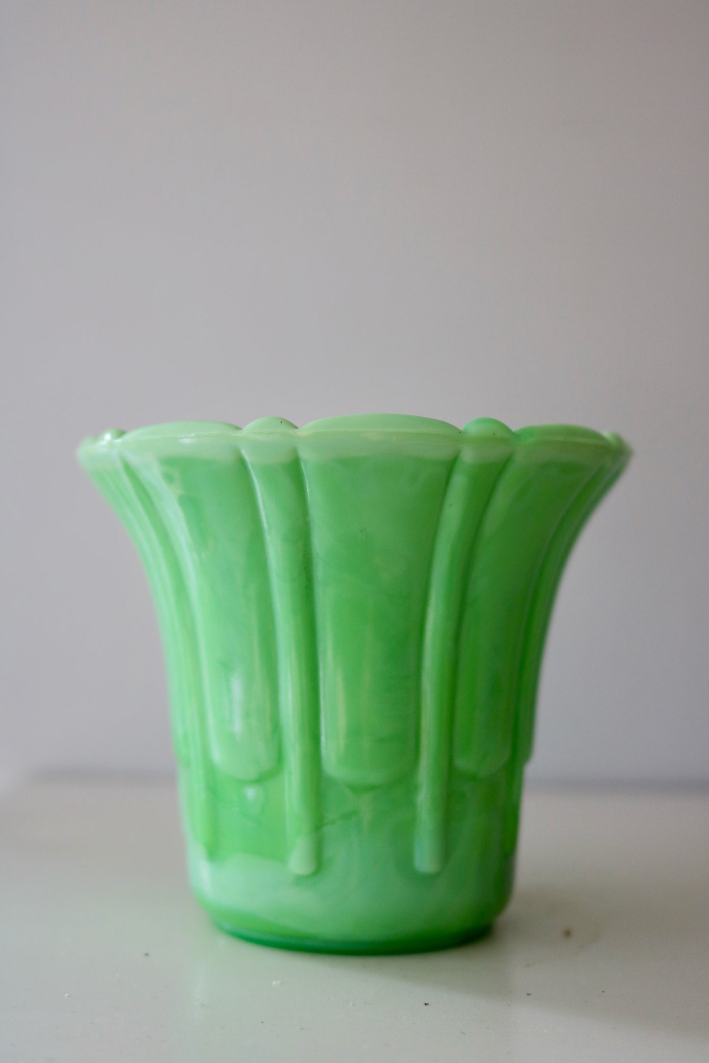 small green Akro Agate flower pot or vase