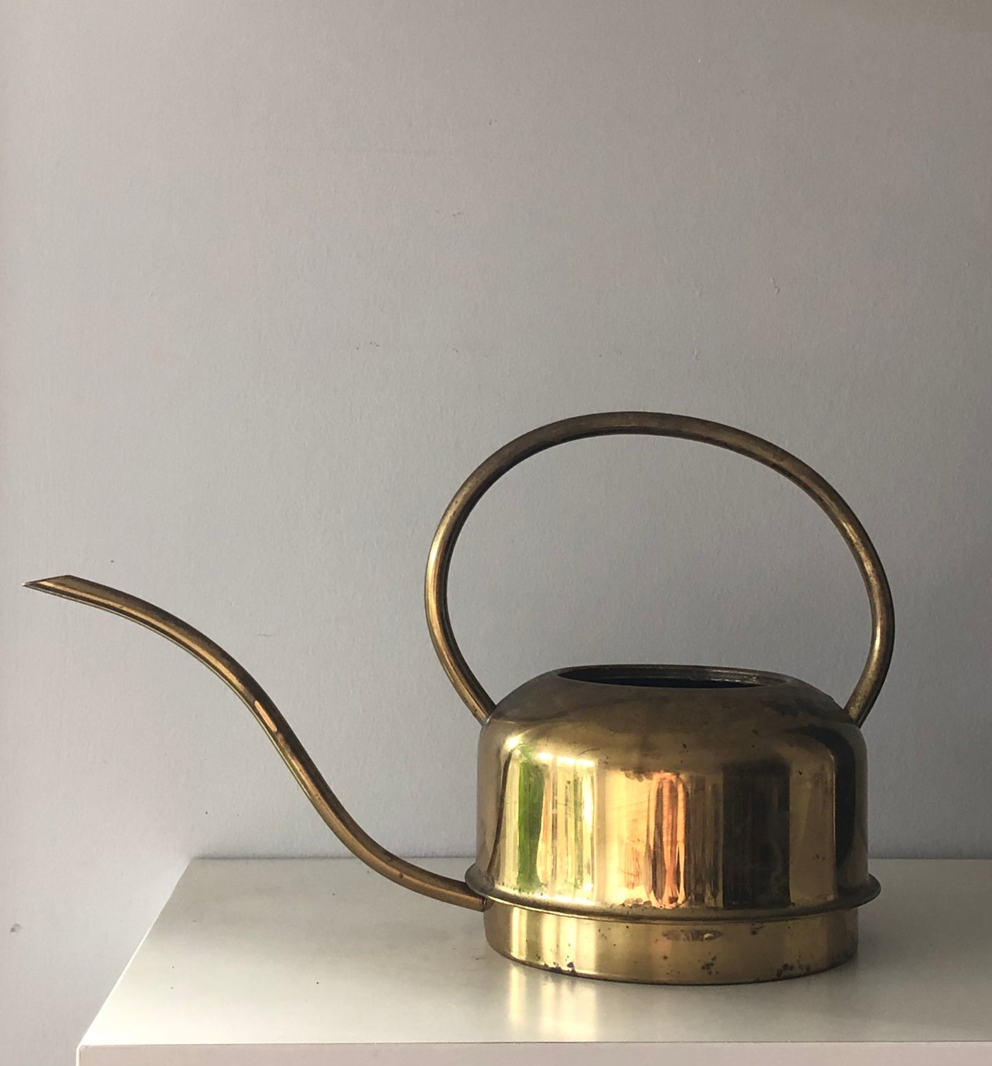 vintage brass watering can